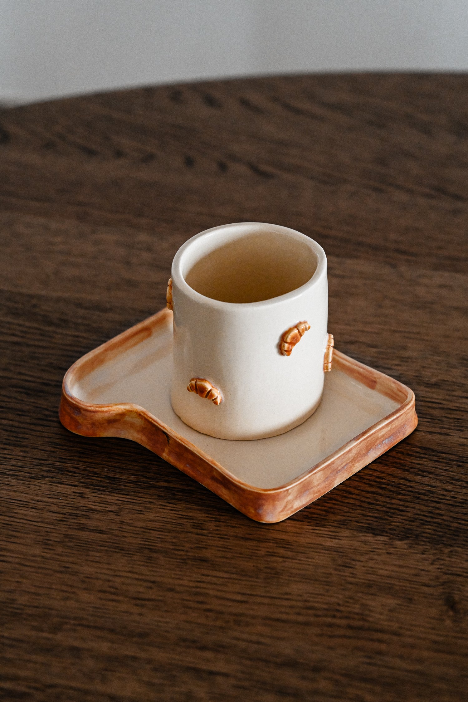 toast bread ceramic plate and croissant mug